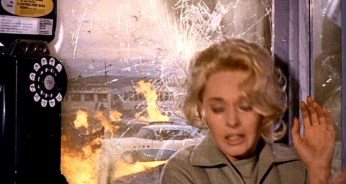 Tippi Hedren in phone booth in The Birds