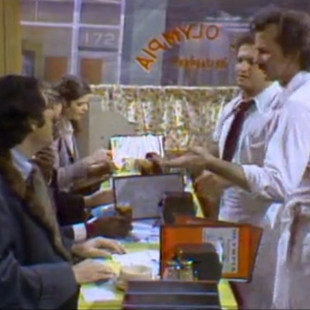 Still from SNL Olympia Cafe sketch
