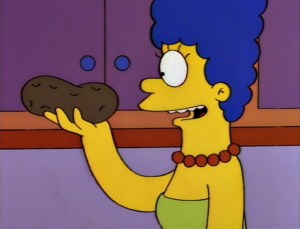 Marge Simpson holds potato