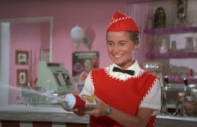 Marcia Brady sprays whipped cream