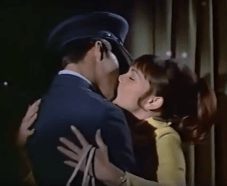 Moondoggie and Gidget kiss