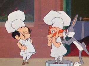 Bugs Bunny whispers to one of the French chefs